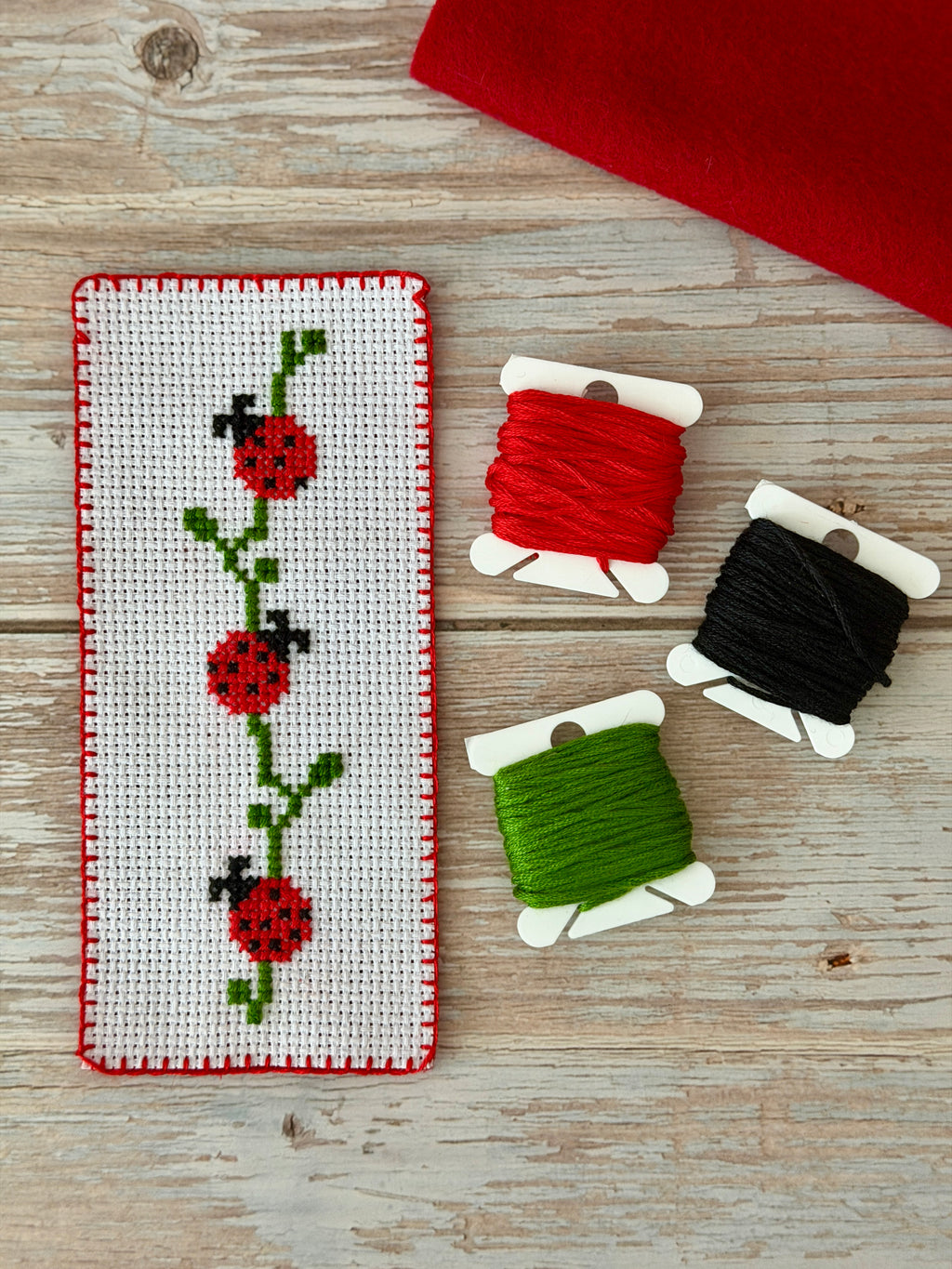 Handmade ladybug cross stitch bookmark for readers and teachers - image 1