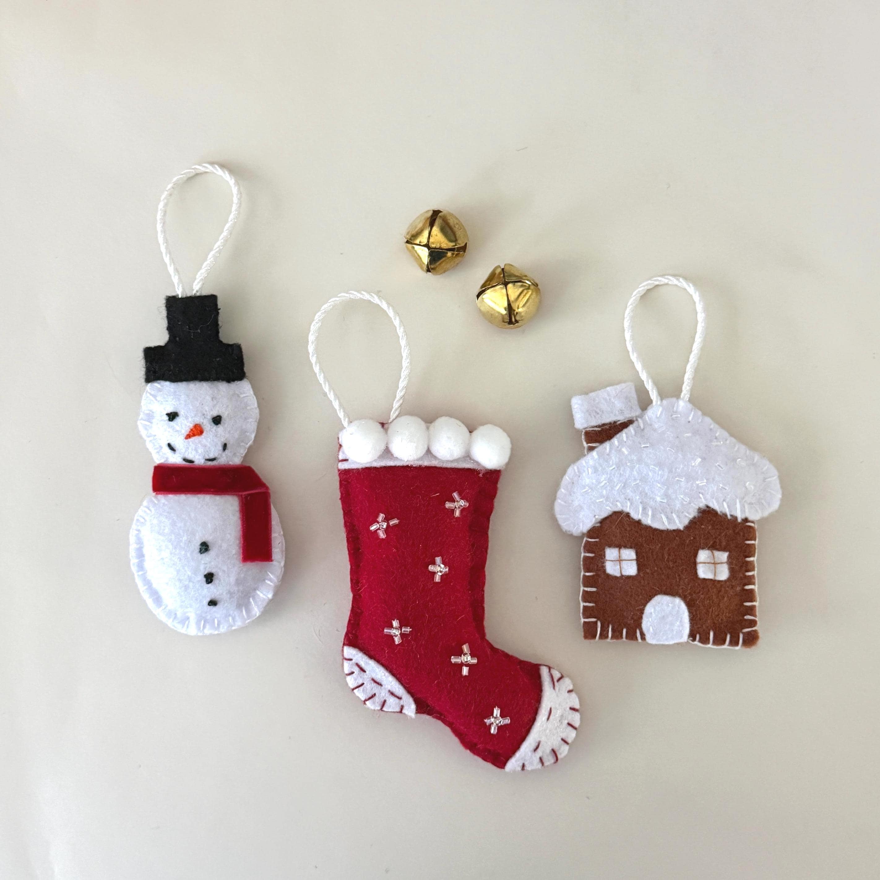 Handmade felt Christmas ornaments with embroidered holiday details - image 3